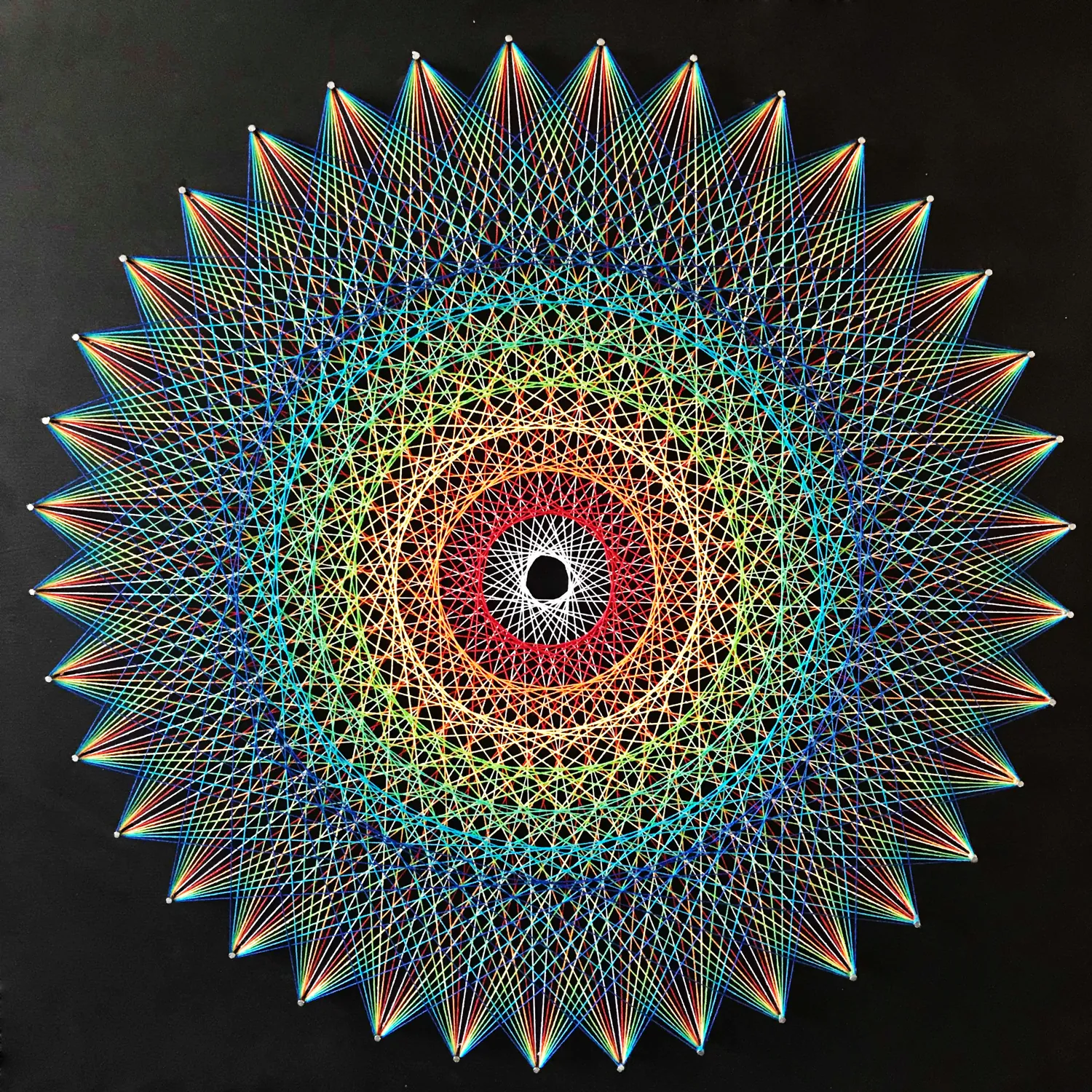 Sun Disc string art, finished piece