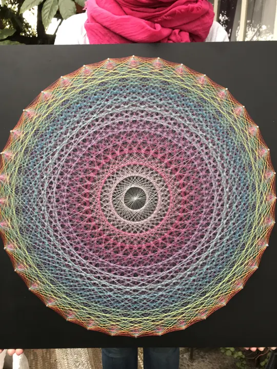 Sun Disc string art, finished piece